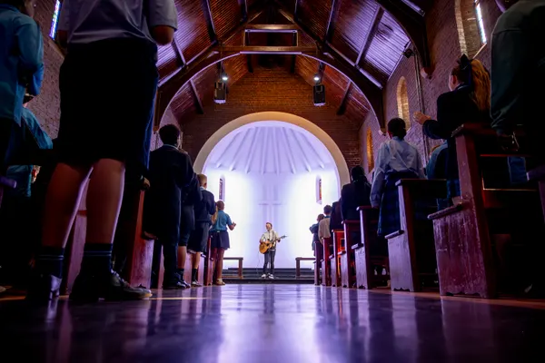 St Luke&rsquo;s College students gathered in the chapel for a guitar performance