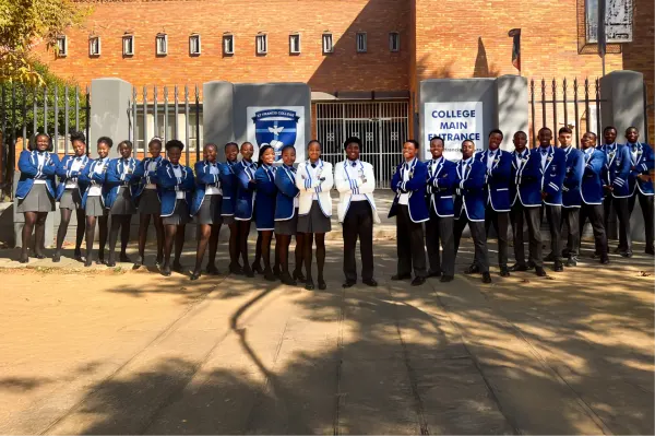 St Francis College students lined up outside the school entrance